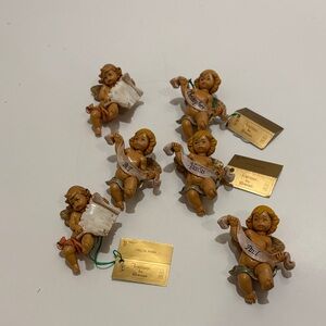 Fontanini cherub set of six. About 2.5” tall. “Simonetti” on each piece.